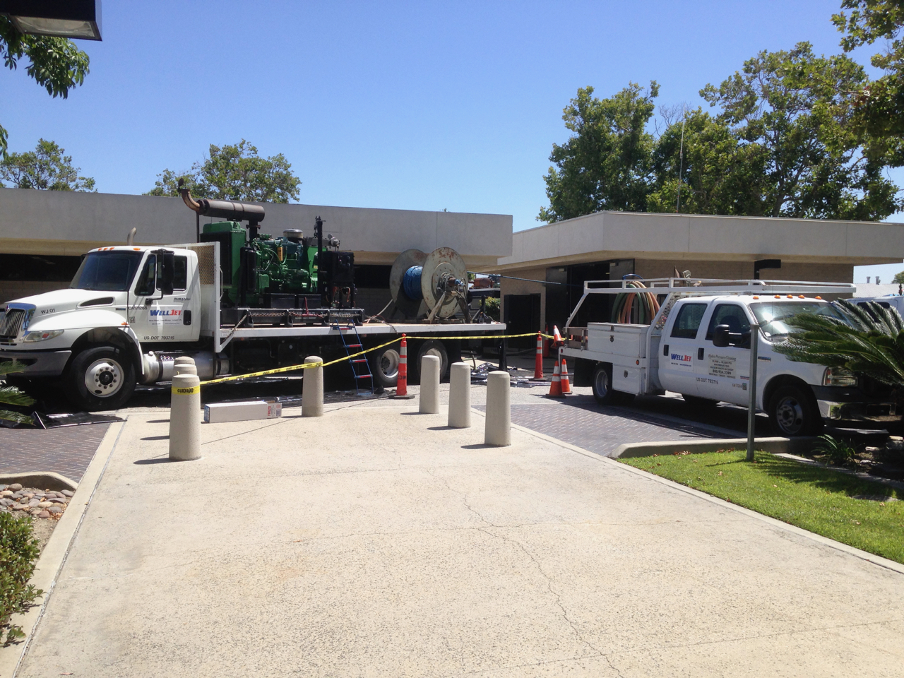 WellJet trucks outside building where well is situated.